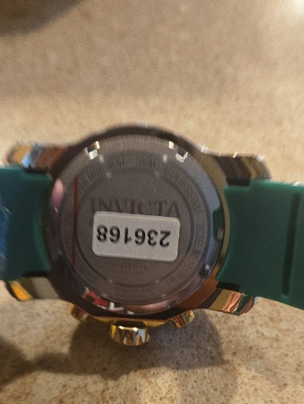 Invicta Green and Gold Chronograph Watch with Green Strap